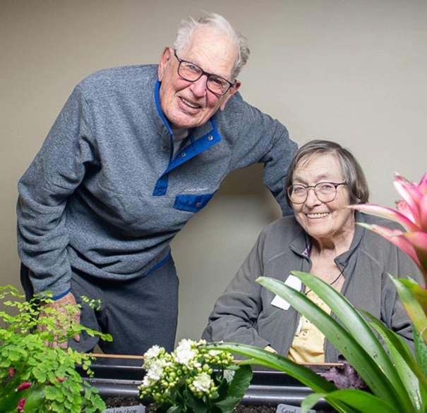 elderly-couple-with-plants