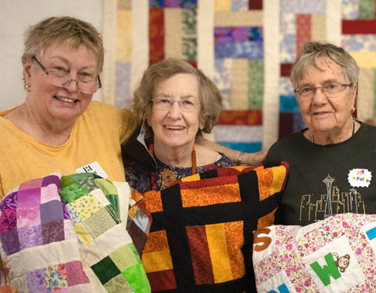 women with quilts 