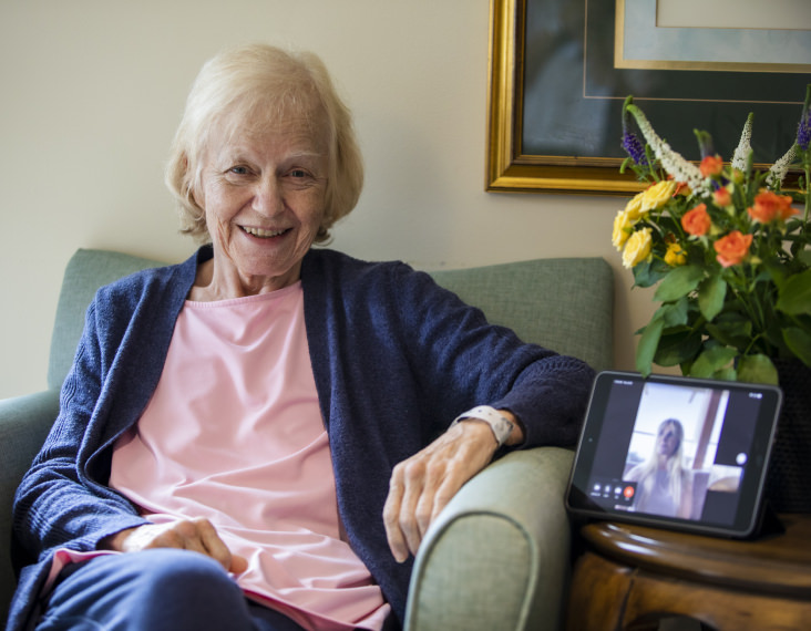 elderly women with tablet