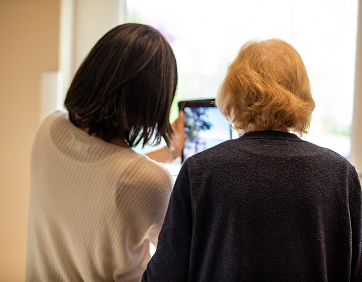 staff and resident viewing tablet