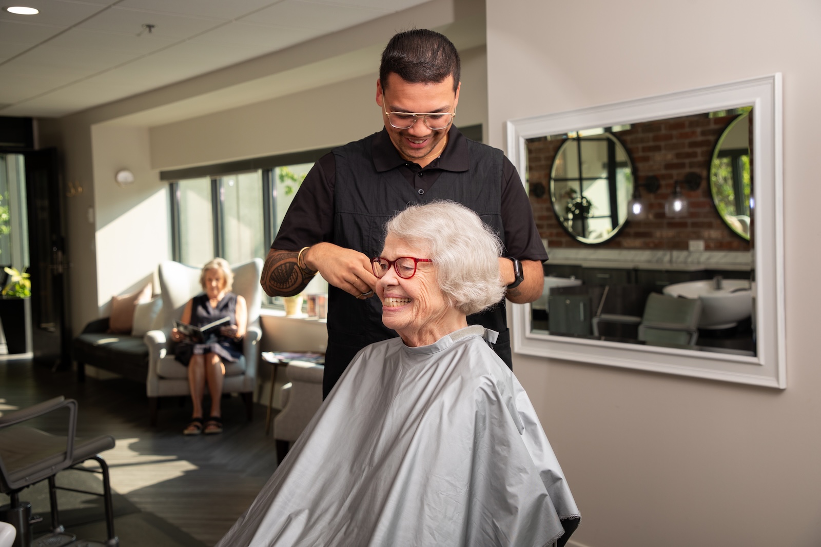 senior woman in a salon getting a haircut
