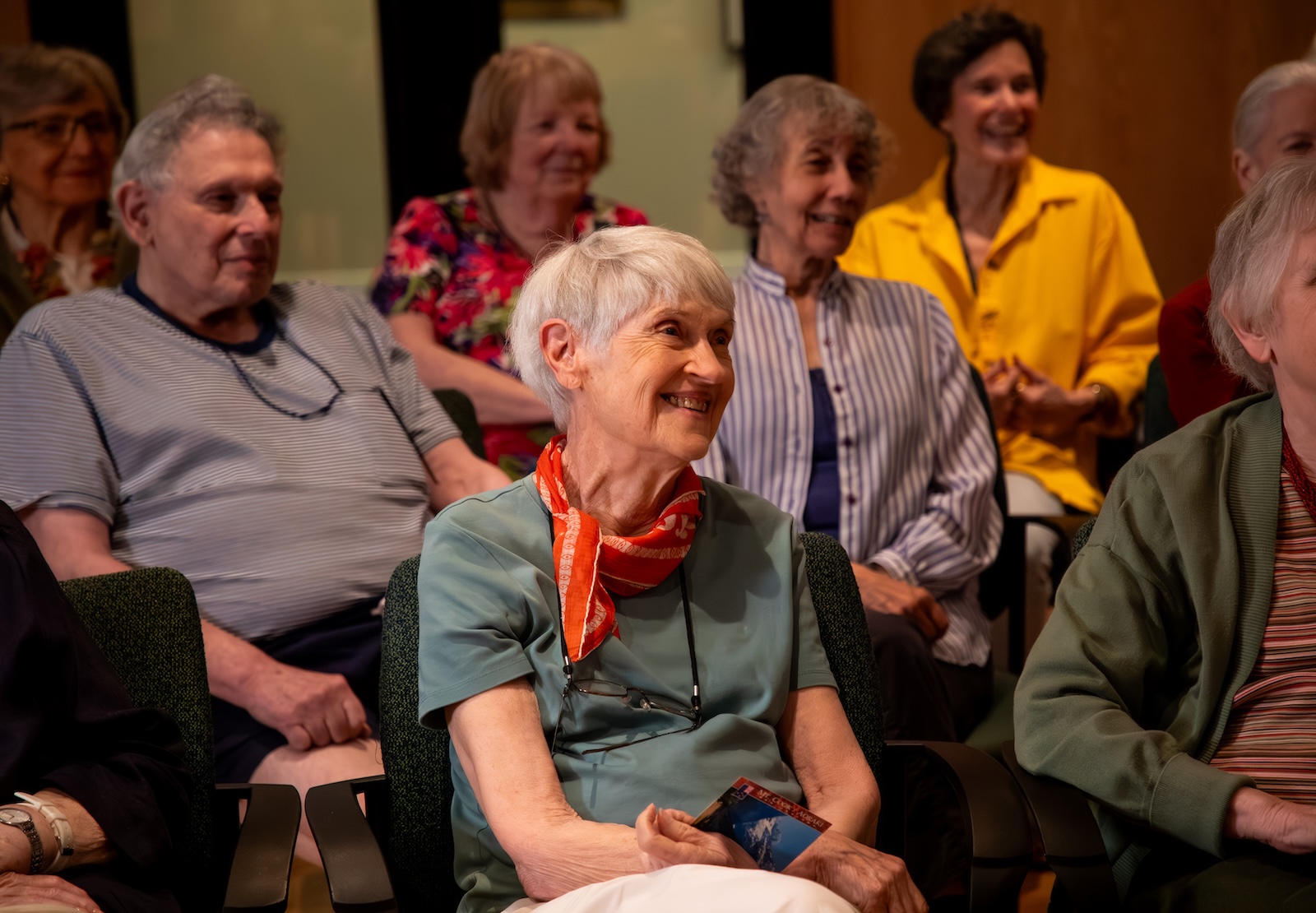 senior council members listen to a speaker